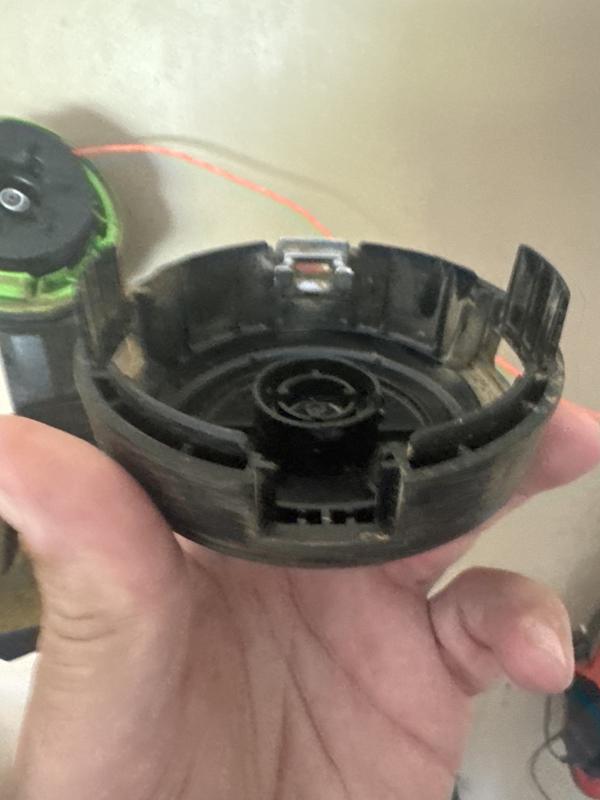 Missing spring and metal guide.