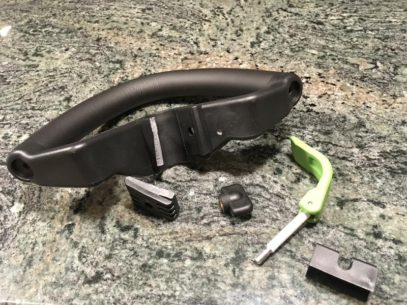 Ego Power Head Quick-Adjust Handle showing broken part.