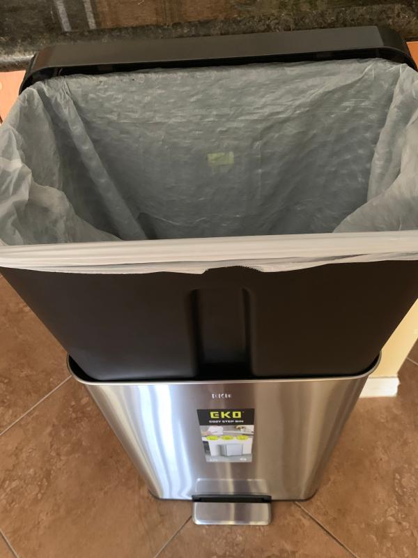 Inside bin held open for use if needed