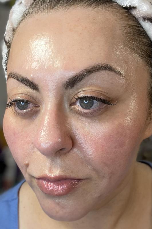 Wearing only Elemis Superfood Glow Priming Moisturizer