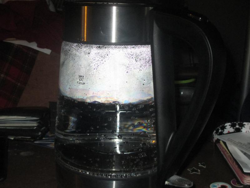 4 minutes later Rolling boil and Automatically shuts off power