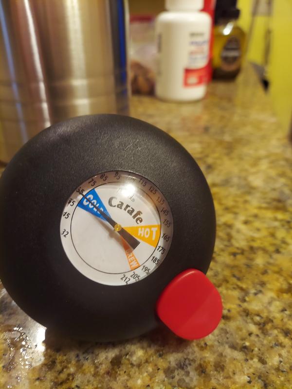 The top lid of the carafe and the temp gauge