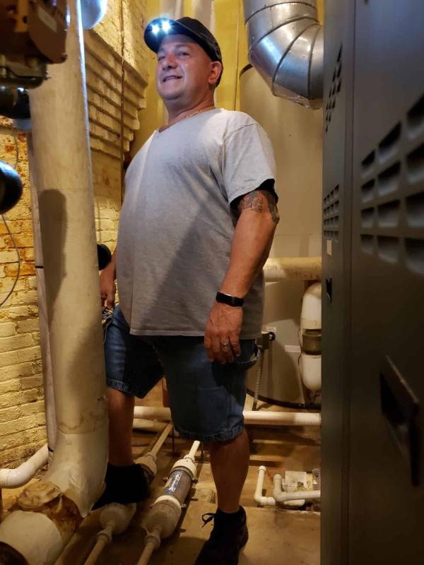 Man working in LED bump cap