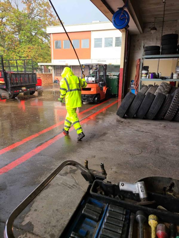 Man working in rain pants