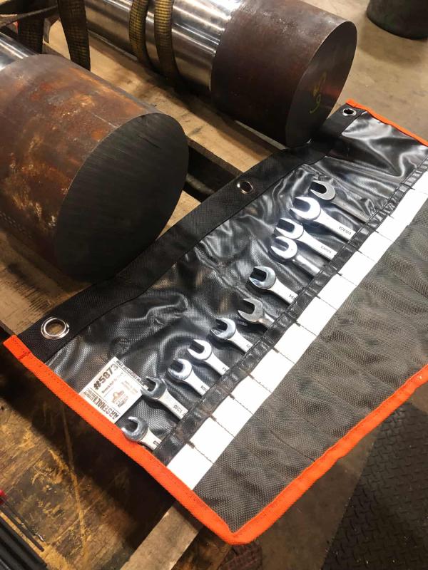 Tough as nails canvas. Extremely well built and easy to roll up.