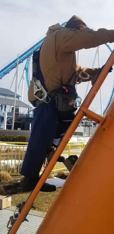 Bag secured to climbing harness.