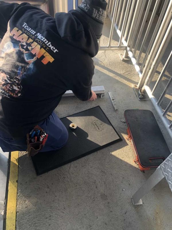 Man working kneeling on kneeling pad