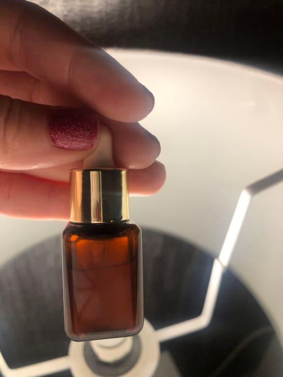 Tried not to tilt too much to show amount through glass with light.