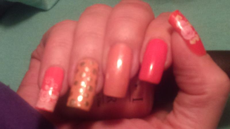 Essie Coral shades and Good As Gold dots.