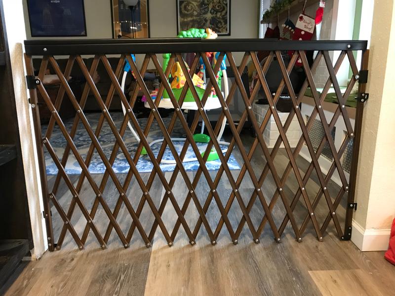 Expansion walk thru store room divider gate