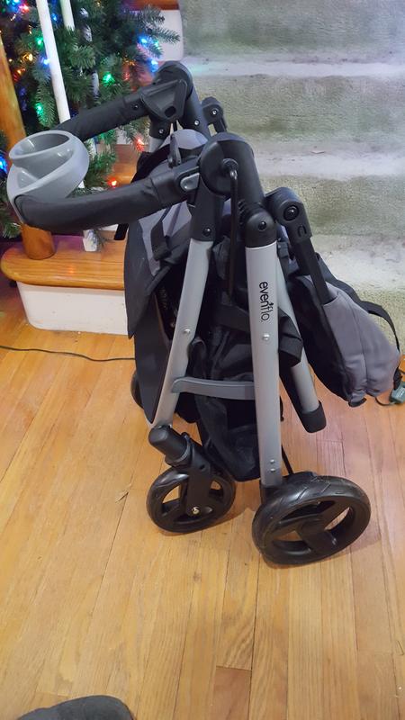 Folded. I had to finagle it to get it standing, it doesn't like to stand like this. It can be a smaller fold if you remove the snack bar, but that's an easy way to carry it.