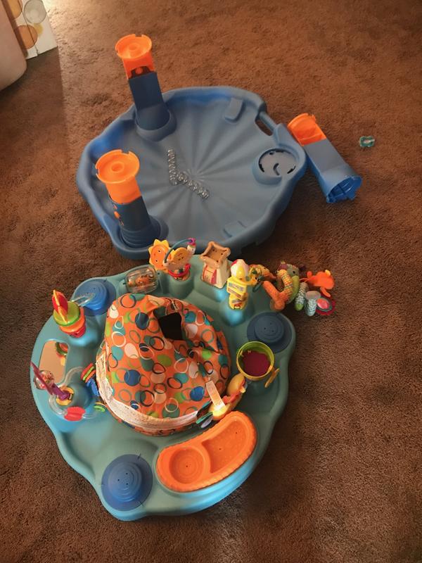 Exersaucer splash outlet