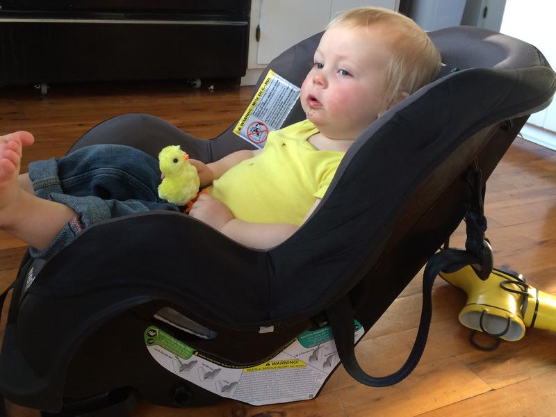 Head within 2” of top. He did enjoy sitting in the car seat! Toddler is 20 months old, about 31-32” tall.