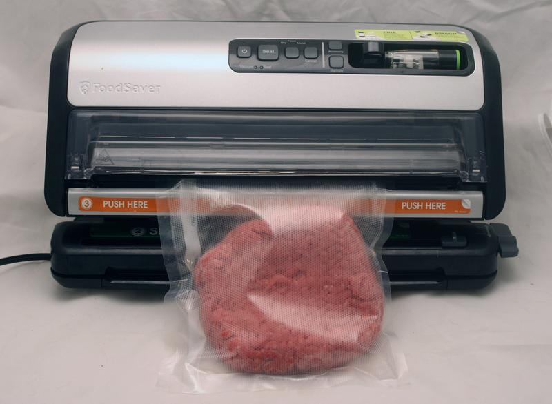 FoodSaver Vacuum Sealer with Express Bag Maker, Built-In Handheld Sealer,  and Bags and Roll Starter Kit - Black - FM5200