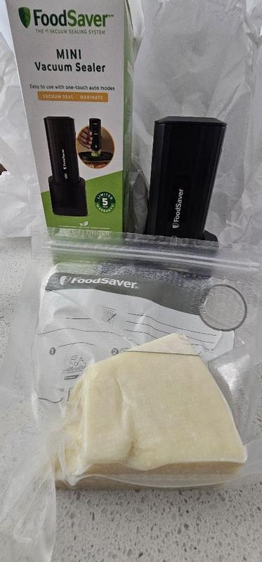 FoodSaver Mini Handheld Vacuum Sealer, Marinate Setting, Cordless Vacuum Sealer with Charging Dock, Black