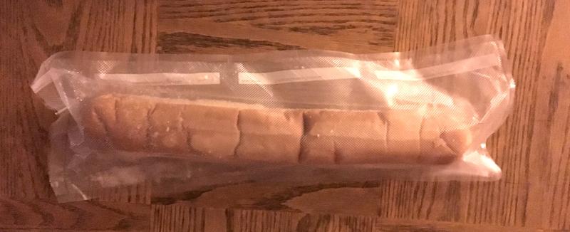 This is a 16" hoagie roll. Fits like a glove! (only seal them, no suction)