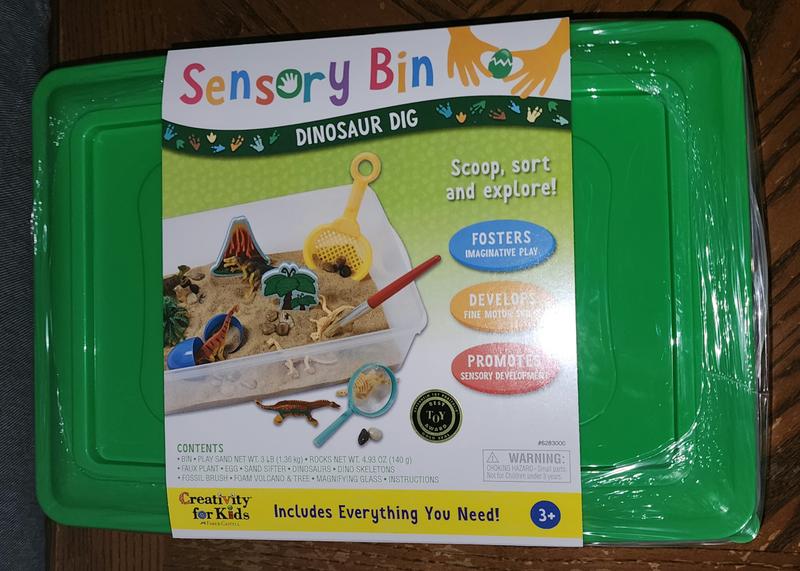 Kids Activities: DIY Kinetic Sand Dinosaur Dig Sensory Bin - Glitter, Inc.
