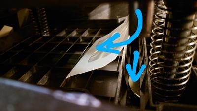An example of envelop getting trapped in that gap rather than going straight down into the blades.