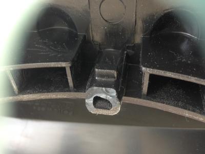 close up of broken piece on the bottom