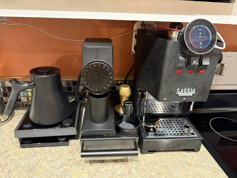 On a small platform with a scale under