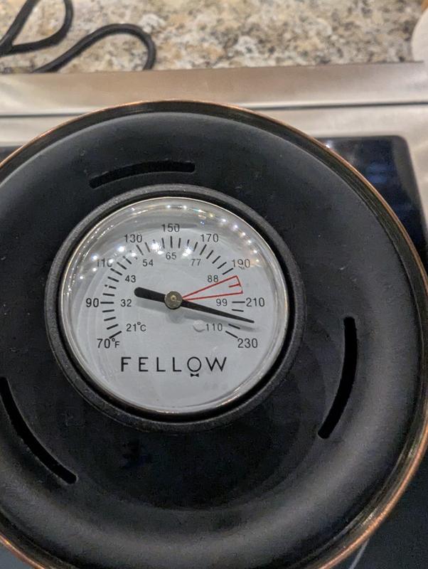 First picture with steamy thermometer is stopping it just before it boils over. Second picture is a different thermometer, reading 209f. Last picture is returning the Fellow thermometer to the water. Reads well above 212 (boiling).