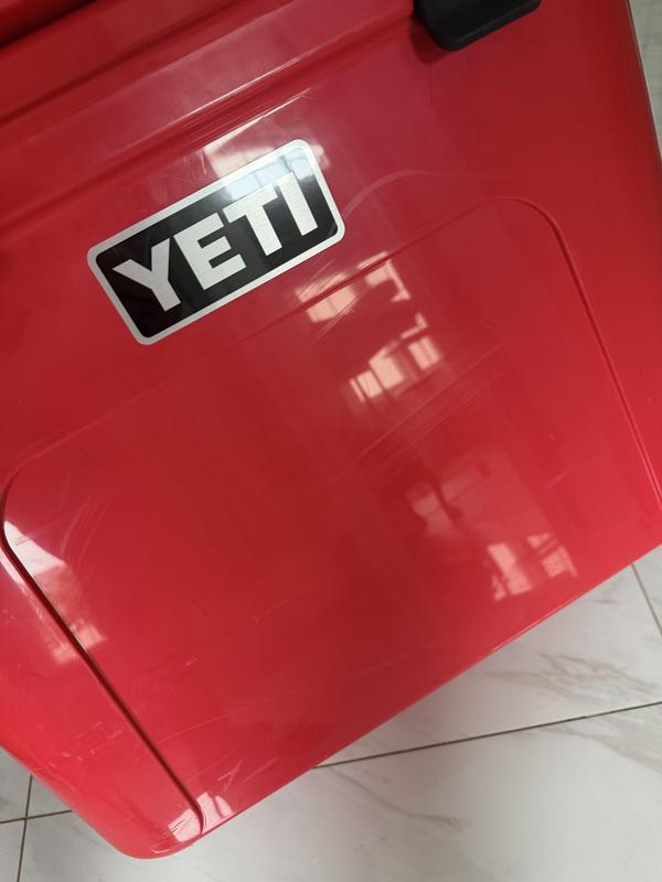 Packaging and scuffed cooler.
