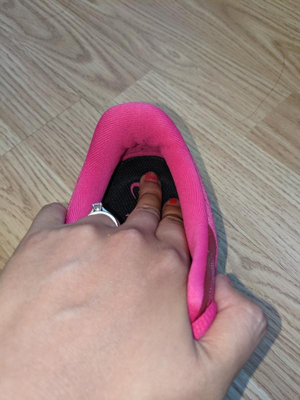 Where my finger is where the heel is and the insole extends up, which might be causing the blister