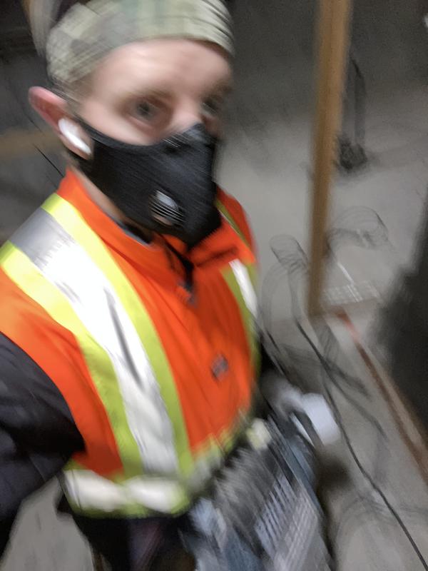 Ear protection with jackhammer shaking photo