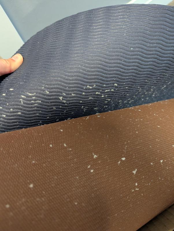 Strange fiberglass like substance on inside of mat