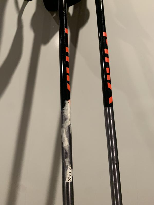 Photo of sticker residue on poles