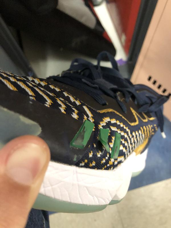The places they are coming apart/ripping. They have only been used as indoor basketball shoes.