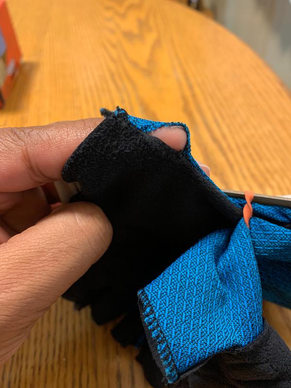 Glove torn at the thumb