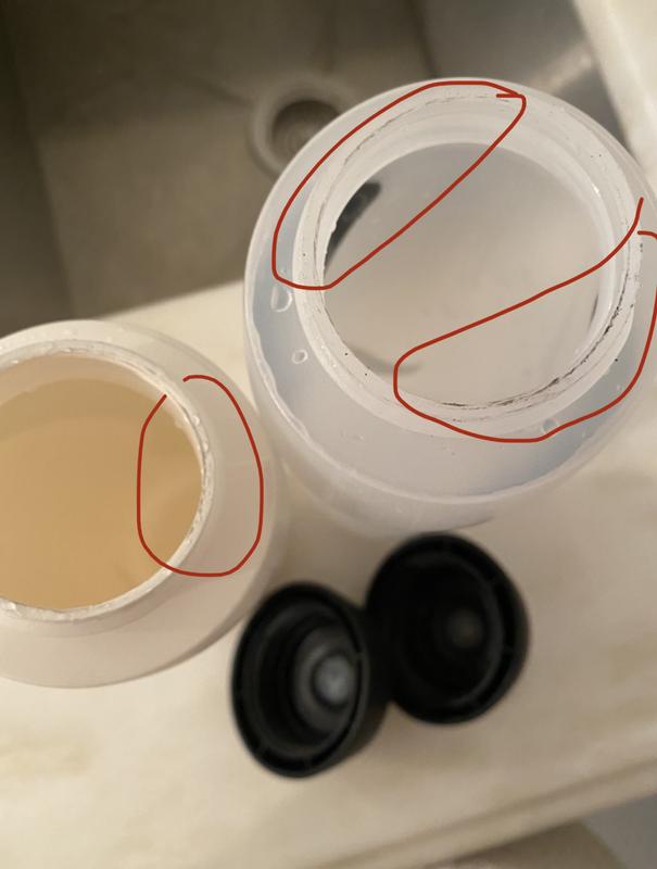 More of the black plastic is seen on the right bottle as I have been using that one more than the one on the left.