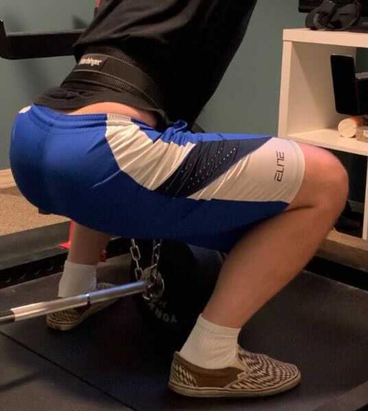 At the bottom of a belt squat. To be able to get more range of motion I could move the connection forward a few links in the chain.