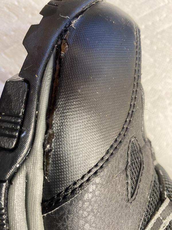 Top,of boot separated from sole letting water in.