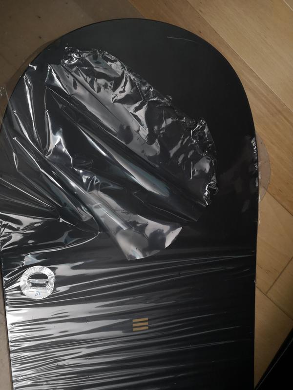 Wrap was damaged and board was scratched