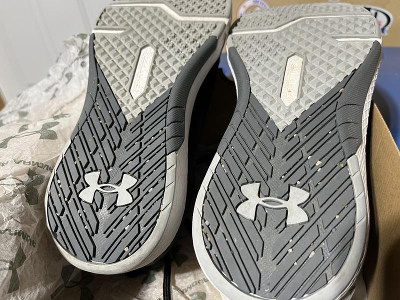 Insole branding worn off in first two pics.pebbles in tread in 3rd pick. Quality control missing on this purchase. These had been worn for quite a while for insole branding to be that worn.