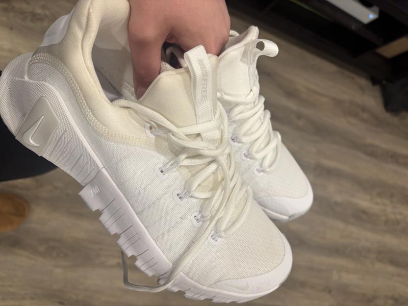 You can see the yellow shoe in comparison to the white one