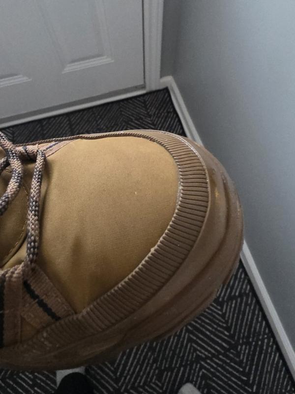 Water stains soaking material from the sole.