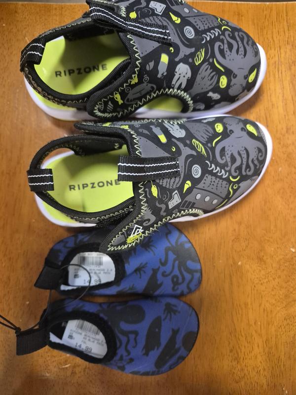Shoes beside a size 9 shoe of a different brand for my toddler