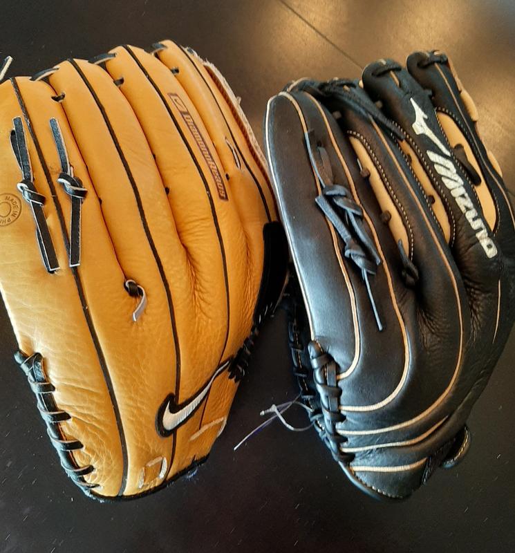 Mizuno "14 inch" on right compared to actual 14inch Nike glove on the left.