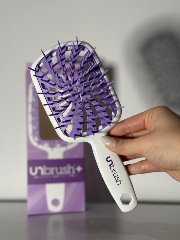 Customer photo for "A brush that cares for your hair as much as you do"