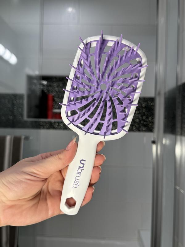 Customer photo for "A brush that cares for your hair as much as you do"