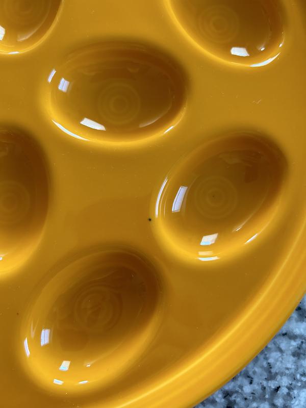 Black speck in glaze