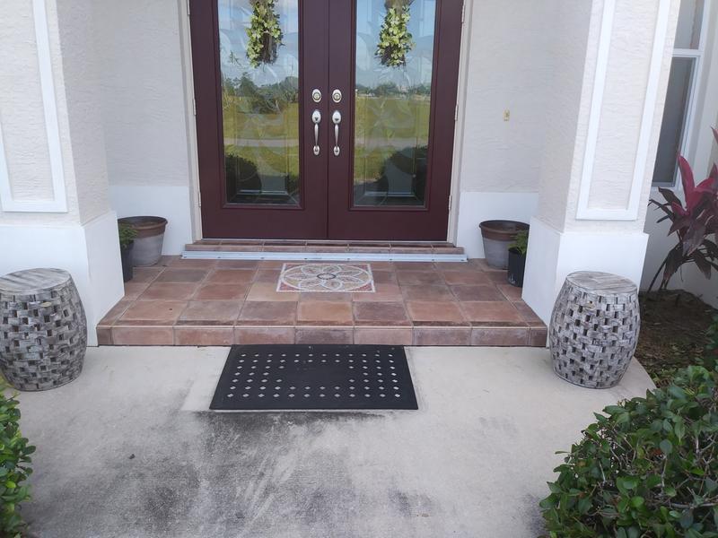 Our two stools out front. (Don’t mind, the walkway needs power Washed).