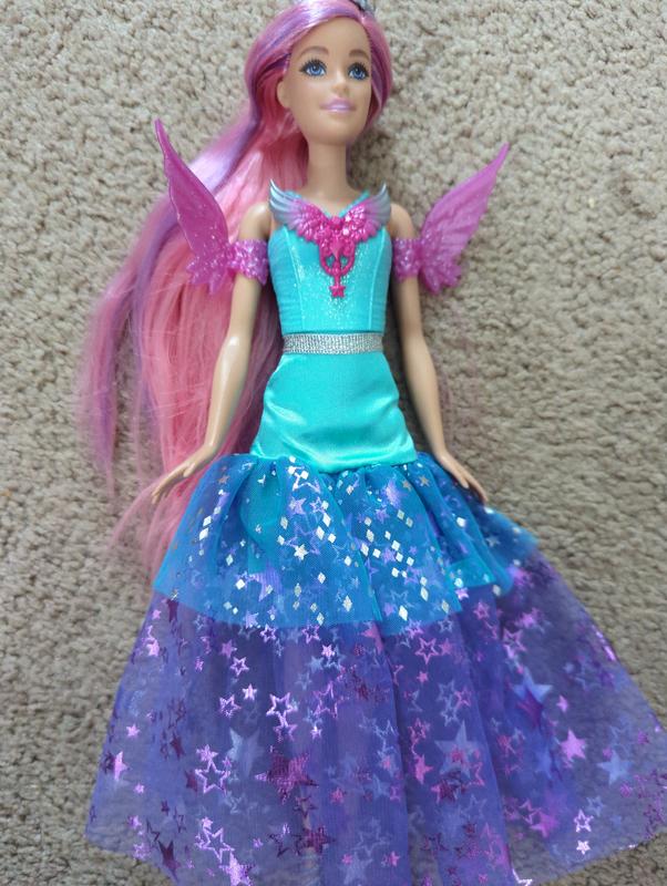 This Barbie doll wears a shimmery fairytale dress and comes
