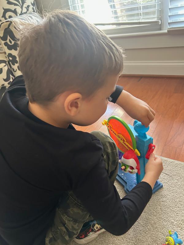 My kiddo trying to steady it at the top, which did not work! Some frustrating moments until he figured it out.