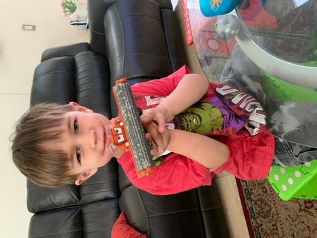 My son with the toy