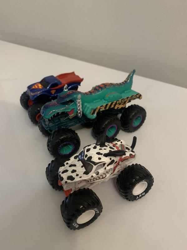 Picture added to compare to regular size monster truck