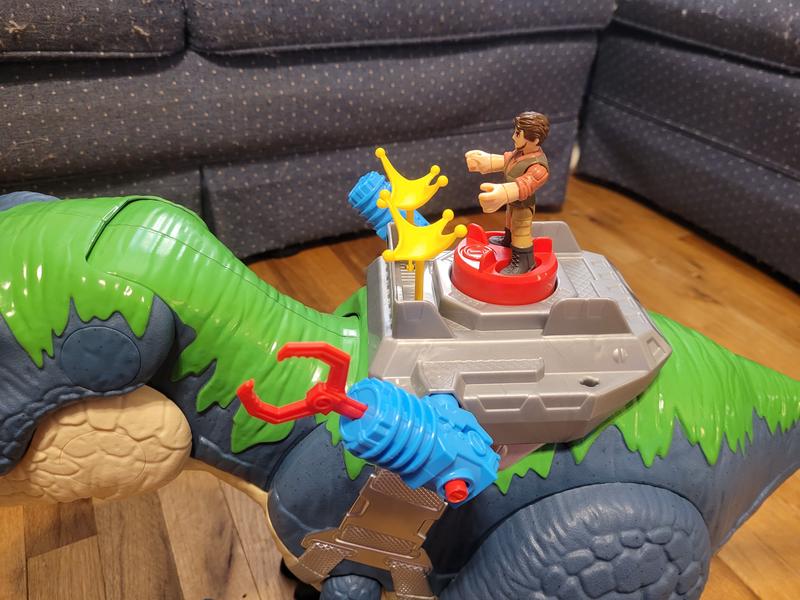 The figurine has a mount on top of the dinosaur to stand on and store projectiles.